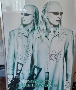 The Matrix Reloaded twins Signed Poster 68 x 98cm in glass frame
